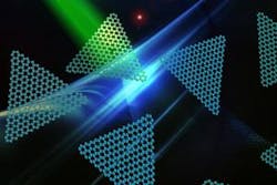 In an artist&apos;s concept, a 2D nanoflake of boron nitride (the triangle with a missing atom, which is a color center) emits single red photons on demand, useful for quantum-communications technologies.