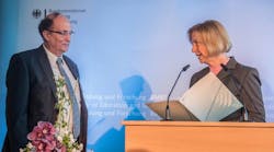 IMAGE. G&uuml;nther Tr&auml;nkle, director of the Berlin-based Ferdinand-Braun-Institut, Leibniz-Institut fuer Hoechstfrequenztechnik (FBH), receives &euro;34 million for investment within Germany&rsquo;s new microelectronics investment program from Federal Minister Johanna Wanka.