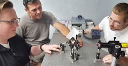 Baker College students Riley Ragsdale, of Clio, Richard Rogers, of Hartland, and Brian Heilner, of Fenton, perform an experiment on the diffraction of monochromatic light in the college’s optics and photonics lab. Baker College students Riley Ragsdale, of Clio, Richard Rogers, of Hartland, and Brian Heilner, of Fenton, perform an experiment on the diffraction of monochromatic light in the college’s optics and photonics lab.