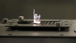 A 200-W ultrashort pulse laser from Amphos machines carbon fiber reinforced plastic.