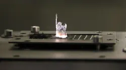 A 200-W ultrashort pulse laser from Amphos machines carbon fiber reinforced plastic.