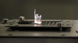 A 200-W ultrashort pulse laser from Amphos machines carbon fiber reinforced plastic. A 200-W ultrashort pulse laser from Amphos machines carbon fiber reinforced plastic.