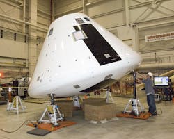 IMAGE: The LGS Innovations laser-based modem will convert the data generated on the Orion spacecraft to an optical signal, allowing it to be beamed from the vicinity of the Moon to a receiver on Earth; shown here is the NASA Orion crew module. IMAGE: The LGS Innovations laser-based modem will convert the data generated on the Orion spacecraft to an optical signal, allowing it to be beamed from the vicinity of the Moon to a receiver on Earth; shown here is the NASA Orion crew module.