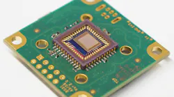 This compact and low-cost spectrometer could help turn ordinary cell phones into advanced analytical tools. At the center of the device, a 210-µm-square photonic-crystal slab sits atop a camera sensor.