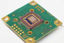 This compact and low-cost spectrometer could help turn ordinary cell phones into advanced analytical tools. At the center of the device, a 210-µm-square photonic-crystal slab sits atop a camera sensor.