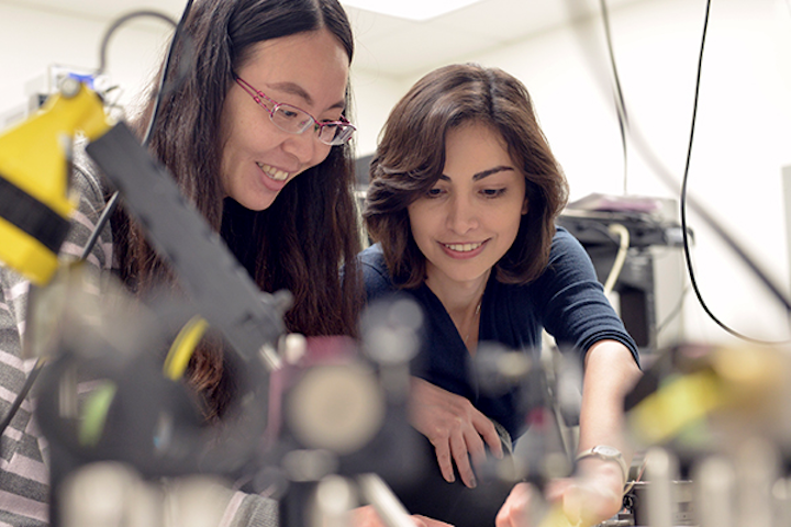 Ning Wang and Mona Jarrahi work on the terahertz detector setup.