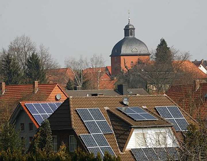 Copper indium gallium diselenide (CIGS) thin-film solar cells are shown mounted on roofs. A new thin-film material, palladium diselenide, could lead to high-performance photovoltaics for satellites and other spacecraft.