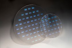 The 200 mm wafers are contrasted in size with the new 300 mm wafers produced using nanoimprint lithography (NIL) to support glass technologies for augmented reality/mixed reality (AR/MR).