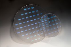 The 200 mm wafers are contrasted in size with the new 300 mm wafers produced using nanoimprint lithography (NIL) to support glass technologies for augmented reality/mixed reality (AR/MR). The 200 mm wafers are contrasted in size with the new 300 mm wafers produced using nanoimprint lithography (NIL) to support glass technologies for augmented reality/mixed reality (AR/MR).