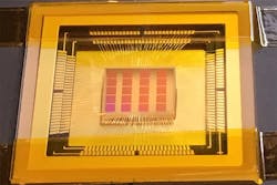 The single-photon detector being developed leverages the Quanta Image Sensor (QIS) semiconductor chip as shown.