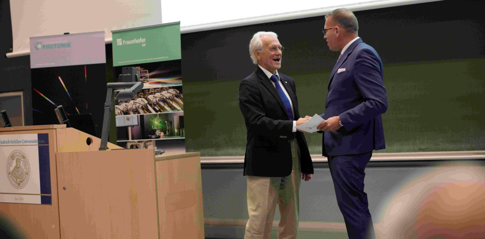 Andreas T&uuml;nnermann, director of the Fraunhofer institute for optics and precision engineering IOF, welcomes Nobel laureate Gerard Mourou in Jena, Germany.