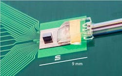 Photograph of a through-silicon-via (TSV)-assisted fin field-effect transistor (FinFET) CMOS/Si photonics transceiver prototype. Photograph of a through-silicon-via (TSV)-assisted fin field-effect transistor (FinFET) CMOS/Si photonics transceiver prototype.