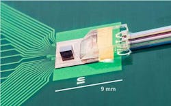 Photograph of a through-silicon-via (TSV)-assisted fin field-effect transistor (FinFET) CMOS/Si photonics transceiver prototype.