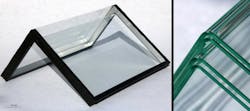 A double-glazed corner element is produced with the new glass-bending process (left). Individual sheets of angled glass at right are three millimeters thick.