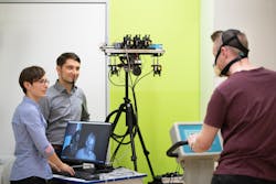 FIGURE 6. The gold standard for performance analysis in sports medicine is based on a set of adhesive sensors and a mask-like respiration sensor; an optical measurement of vital data is contact-free and releases the test person from all of these sensors. FIGURE 6. The gold standard for performance analysis in sports medicine is based on a set of adhesive sensors and a mask-like respiration sensor; an optical measurement of vital data is contact-free and releases the test person from all of these sensors.