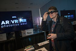 FIGURE 6. Headset demonstrations allow XR symposium attendees to have fun while experiencing the technology and learning from invited industry talks and panel discussions.