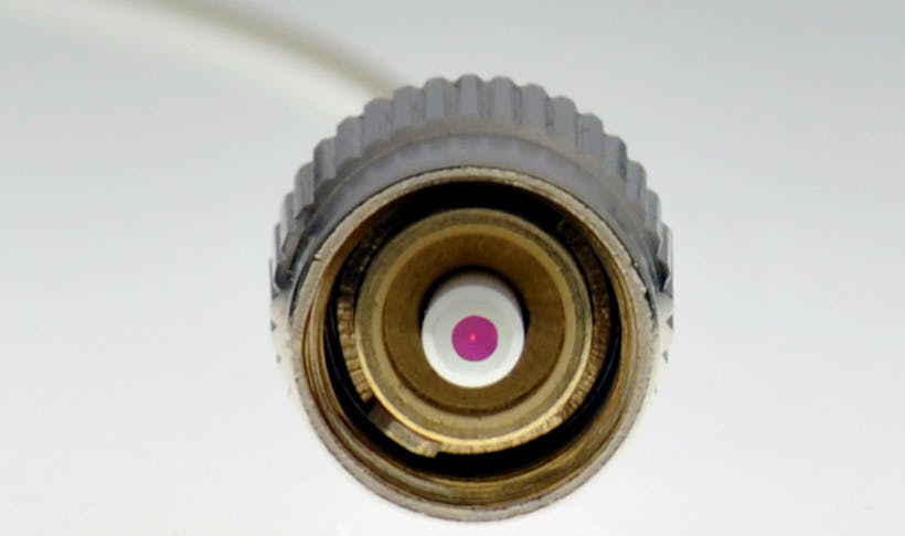 An example optical-fiber tip coated by Omega Optical.