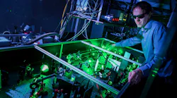 FIGURE 1. Stefan Witte aligns a laser system used for high-harmonic generation.