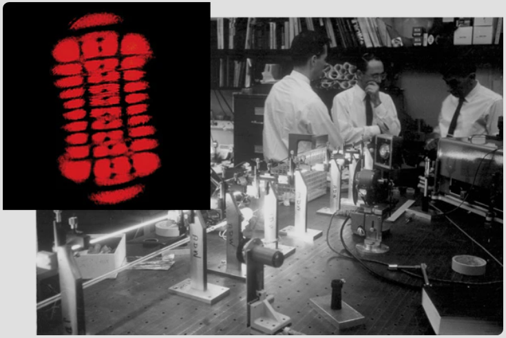 Bell Labs has a long history of invention, including the first gas laser in 1962, a He-Ne laser, created by Alan White and Dane Rigden. Here, Alan White (center) is with two colleagues and a more powerful version of the red He-Ne laser at Bell Labs in 1963; the inset shows the output beam from the original red He-Ne laser operating in a high-order transverse mode.