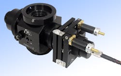 FIGURE 2. The IS-OGP is a modular sub-assembly from Siskiyou that collimates light from an input single-mode fiber and directs it anywhere in the field of view of an upright microscope via a 45° beamsplitter. The resultant light spot has an adjustable diameter and can be precisely located or scanned via mechanical (differential screw) or automated actuators. FIGURE 2. The IS-OGP is a modular sub-assembly from Siskiyou that collimates light from an input single-mode fiber and directs it anywhere in the field of view of an upright microscope via a 45° beamsplitter. The resultant light spot has an adjustable diameter and can be precisely located or scanned via mechanical (differential screw) or automated actuators.