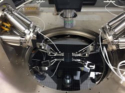 FIGURE 1. Two H-811 miniature hexapods made by PI for fast, multichannel parallel alignment (FMPA) are mounted on a Cascade Microtech silicon-photonics wafer prober. FIGURE 1. Two H-811 miniature hexapods made by PI for fast, multichannel parallel alignment (FMPA) are mounted on a Cascade Microtech silicon-photonics wafer prober.