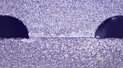 FIGURE 1. A >0.3 mm glass wafer with isotropically etched channels is bonded with room-temperature UV adhesive to a 1-mm-thick glass wafer; the glass:glass bond preserves bioactivity of encapsulated biomolecules/cells.