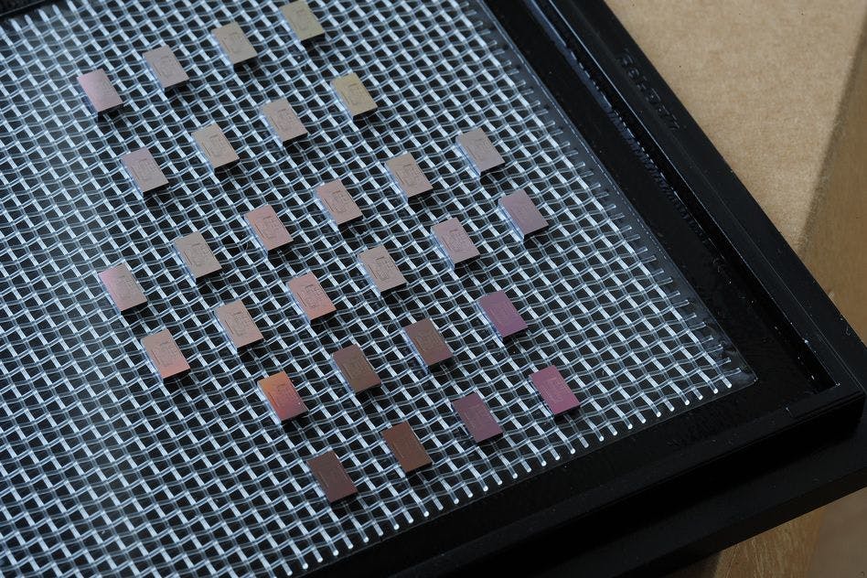 Developed at MIT, these mini-spectrometer chips arrayed on a tray were then fabricated using conventional chipmaking processes.