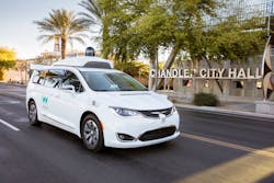 Waymo&rsquo;s fully self-driving Chrysler Pacifica hybrid is seen on a public road in Chandler, CA.