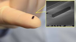 A laser-driven electron accelerator chip made up of two parallel rows of nanopillars is shown on the tip of a finger along with an electron microscope image of the chip.