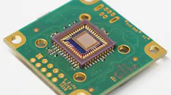This compact and low-cost spectrometer could help turn ordinary cell phones into advanced analytical tools; at the center of the device, a 210-µm-square photonic-crystal slab sits atop a camera sensor.