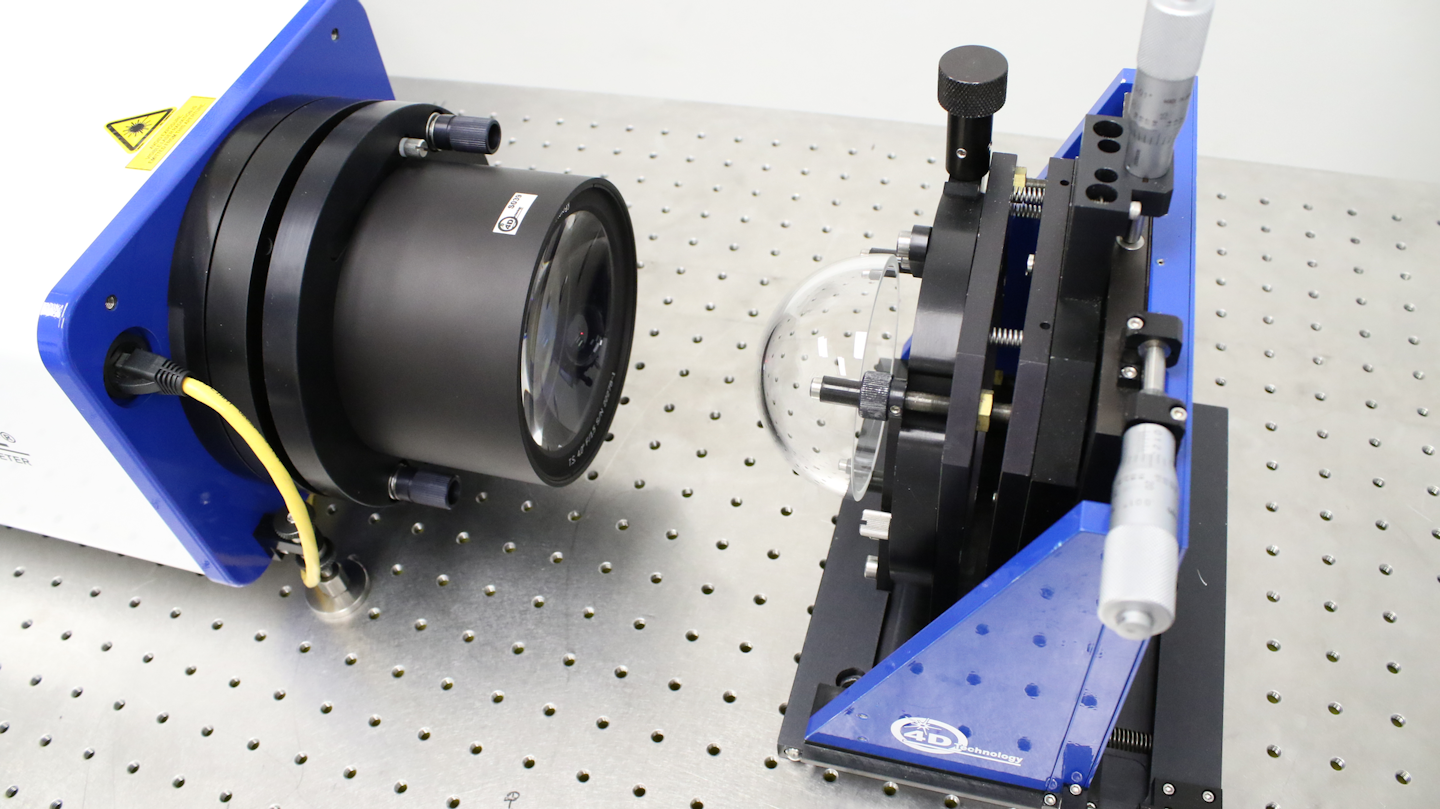 Short coherence laser interferometer measures transparent domes Laser