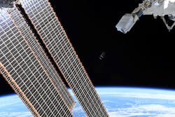 An image of SpooQy-1 was taken as the nanosatellite was deployed from the International Space Station (the satellite is barely visible near the center of the image). An image of SpooQy-1 was taken as the nanosatellite was deployed from the International Space Station (the satellite is barely visible near the center of the image).