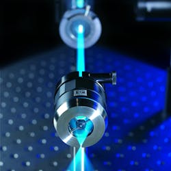FIGURE 2. Fixed reflective objectives such as the one shown here focusing a high-power blue laser beam in a biomedical application can be simpler, more rugged, and more compact than their lens-based equivalents. FIGURE 2. Fixed reflective objectives such as the one shown here focusing a high-power blue laser beam in a biomedical application can be simpler, more rugged, and more compact than their lens-based equivalents.