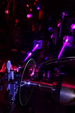 A prototype optical holographic drive system records data onto a volume-holographic disc capable of holding 500 Gbytes of data. A prototype optical holographic drive system records data onto a volume-holographic disc capable of holding 500 Gbytes of data.