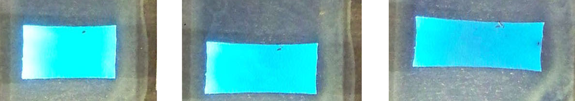 An emissive polymer light-emitting device operating at 8 V undergoes strains of 0% (left), 20% (center), and 45% (right).