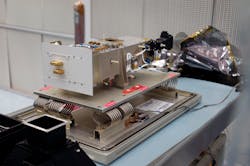 The Lyman Alpha Mapping Project (LAMP) imaging spectrometer aboard the LRO (shown here in a pre-flight photo) has detected helium in the Moon&rsquo;s tenuous atmosphere based on far-ultraviolet (121.6 nm) hydrogen Lyman-alpha emissions.