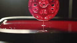FIGURE 3. A component is fabricated using a 3D printing process called continuous liquid interface production (CLIP). FIGURE 3. A component is fabricated using a 3D printing process called continuous liquid interface production (CLIP).