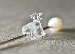 FIGURE 5. This structure was fabricated in fused silica using selective laser-induced etching (SLE). FIGURE 5. This structure was fabricated in fused silica using selective laser-induced etching (SLE).