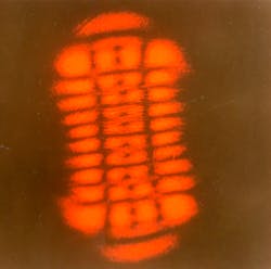 FIGURE 1. The first red helium-neon laser generated striking patterns of high-order modes at Bell Labs.