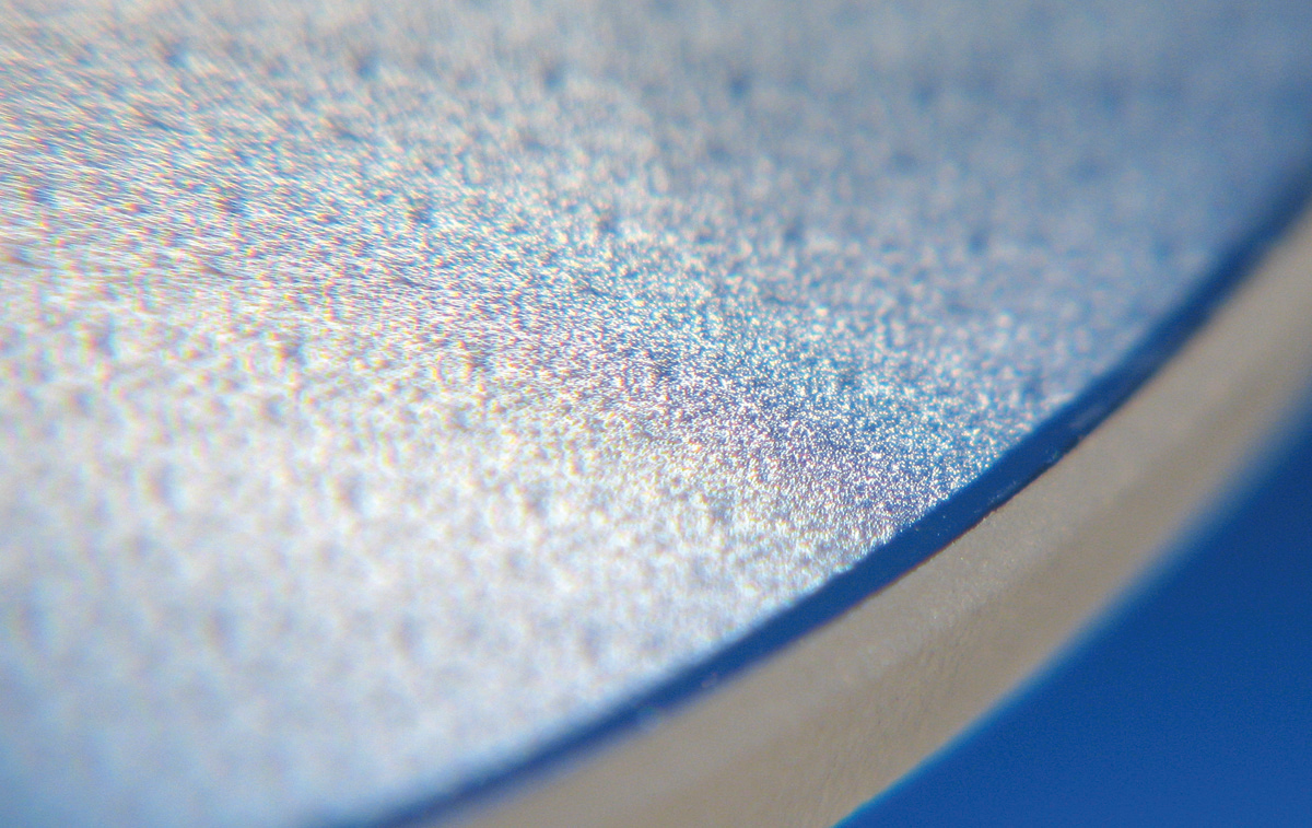 FIGURE 2. In addition to refractive micro-optic elements, the etching technique also produces diffractive micro-optic elements.