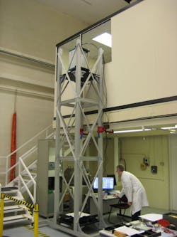 FIGURE 2. A Zygo DynaFiz metrology instrument is mounted on a tower for use in measuring large optics with long radius of curvature using dynamic carrier fringe technology. FIGURE 2. A Zygo DynaFiz metrology instrument is mounted on a tower for use in measuring large optics with long radius of curvature using dynamic carrier fringe technology.