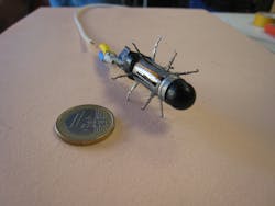 FIGURE 3. A 'mesoscale legged locomotion' design consisted of appendages to allow a robotic capsule endoscope to traverse the esophageal or gastrointestinal tract; unfortunately, it was not successful and is being replaced by alternative designs. FIGURE 3. A 'mesoscale legged locomotion' design consisted of appendages to allow a robotic capsule endoscope to traverse the esophageal or gastrointestinal tract; unfortunately, it was not successful and is being replaced by alternative designs.