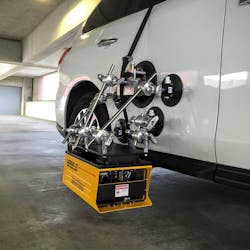 The RoadVista LLG7 laser-scanning road measurement instrument is mounted on a car using vacuum-cup mounting technology originally developed for the motion picture industry.