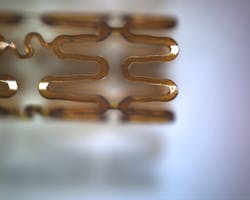 FIGURE 2. Using a high scan-speed in conjunction with a multi-pass cutting strategy for stent processing results in keeping heat input to a minimum; strut thicknesses of 20 μm can be obtained. FIGURE 2. Using a high scan-speed in conjunction with a multi-pass cutting strategy for stent processing results in keeping heat input to a minimum; strut thicknesses of 20 μm can be obtained.