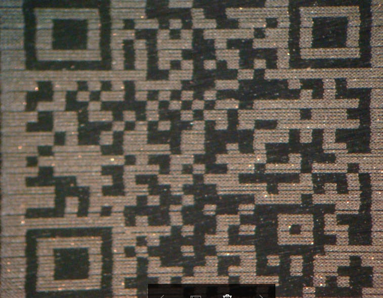 FIGURE 4. The laser-printed images were easily readable from a distance of 12 in., and a QR code was readable by a typical handheld QR code reading application.