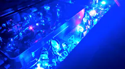 FIGURE 1. In this fully diode-pumped ultrafast Ti:sapphire oscillator-amplifier system, the Kerr-lens-modelocked Ti:sapphire oscillator is pumped with a single-emitter 465 nm diode (3.1 W), while the amplifier is pumped by either high-power fiber-coupled 450 nm diodes (up to 100 W), or spatially/spectrally combined 465/450 nm single emitters (up to 30 W), and is cryogenically cooled.