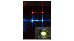 FIGURE 1. This composite microscope image shows a 488 nm laser beam (center) and a 640 nm laser beam (top) focused from the side into a flowcell channel (vertical channel walls visible because of scattered light). A flowing sample of 3 μm fluorescent beads lights up in the 488 nm beam (bright oval in the center). The fluorescence light collection path (inset; concentric circles) is aligned behind the flowcell under LED illumination.