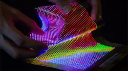 FIGURE 1. A microLED panel shows how the tiny, closely spaced pixels can be integrated into flexible materials for personal wearable displays.
