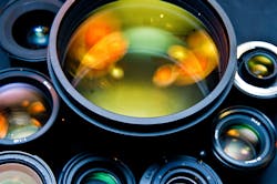 FIGURE 1. An example assortment of multielement optical lenses. FIGURE 1. An example assortment of multielement optical lenses.