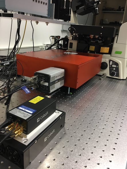 FIGURE 3. Advantages of a compact multi-line laser in a lab environment are space saving, reduced complexity, and reduced need for service and intervention; this type of laser is shown in use in the Department of Biotechnology &amp; Biophysics at Julius-Maximilian-University of Würzburg.